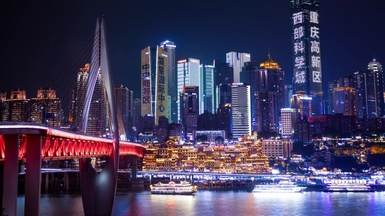 Chongqing’s illuminated riverfront and layered skyline at night